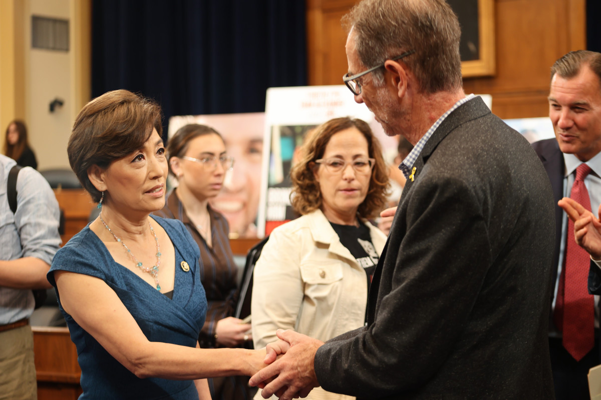 Rep. Young Kim Shaking Hands with Family of Hostage Taken by Hamas